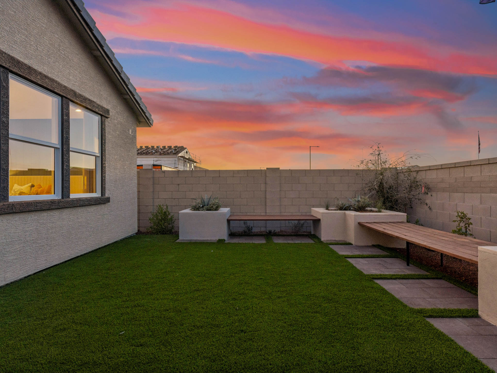 A building with a grass yard.