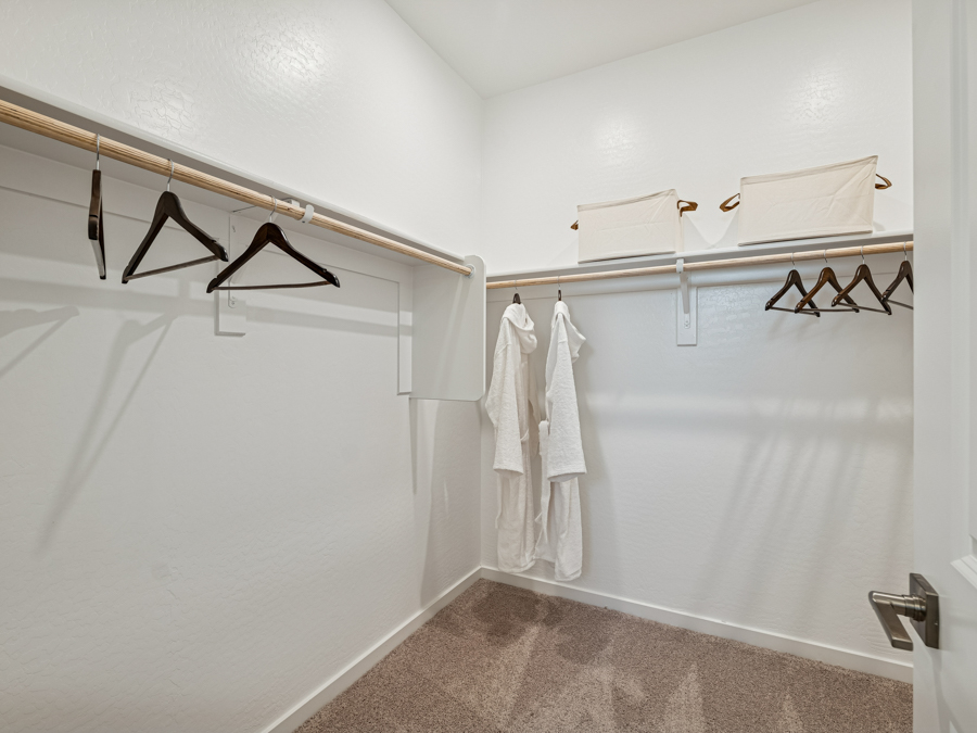 A bathroom with white walls.