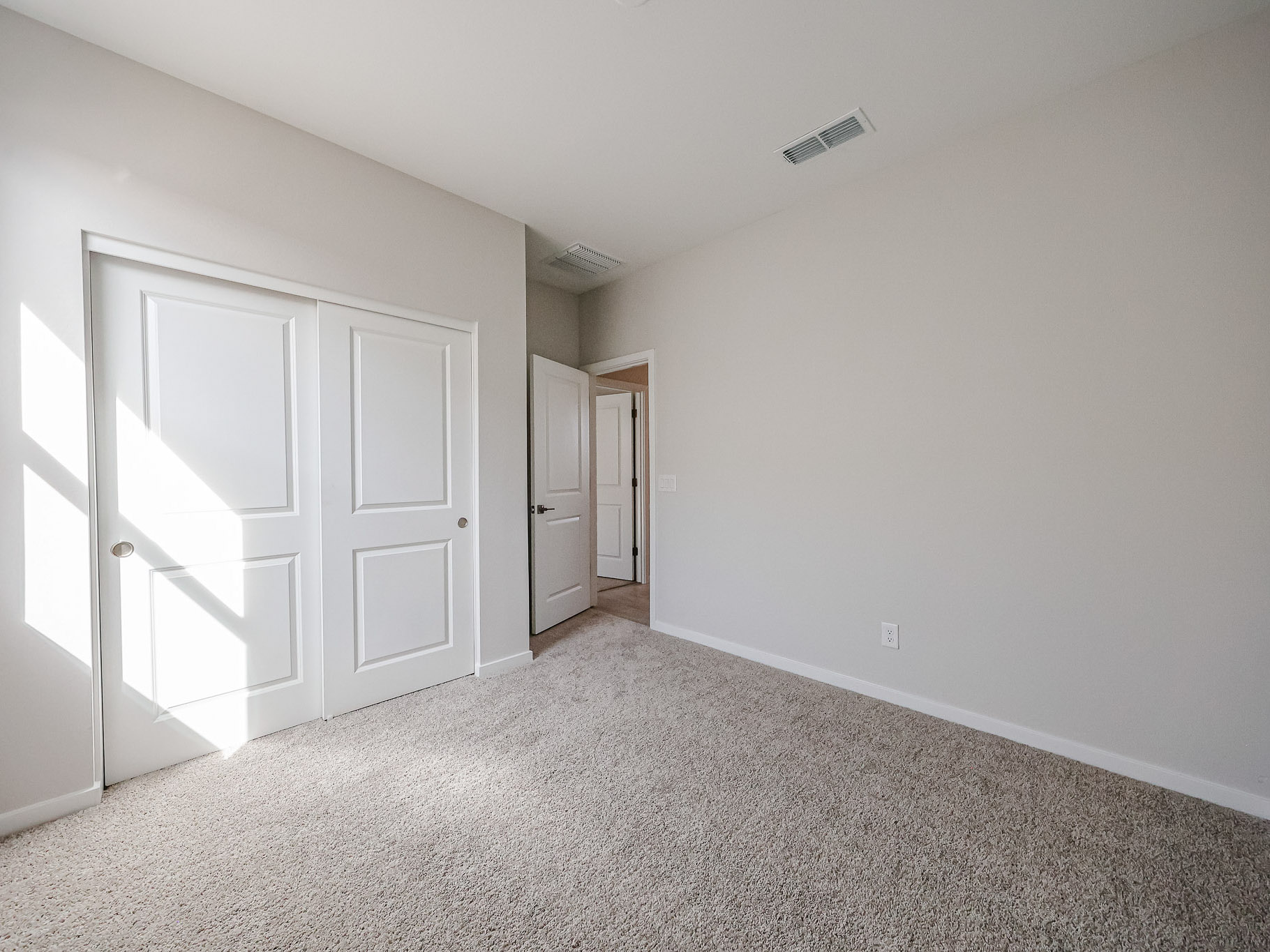 A room with white doors.