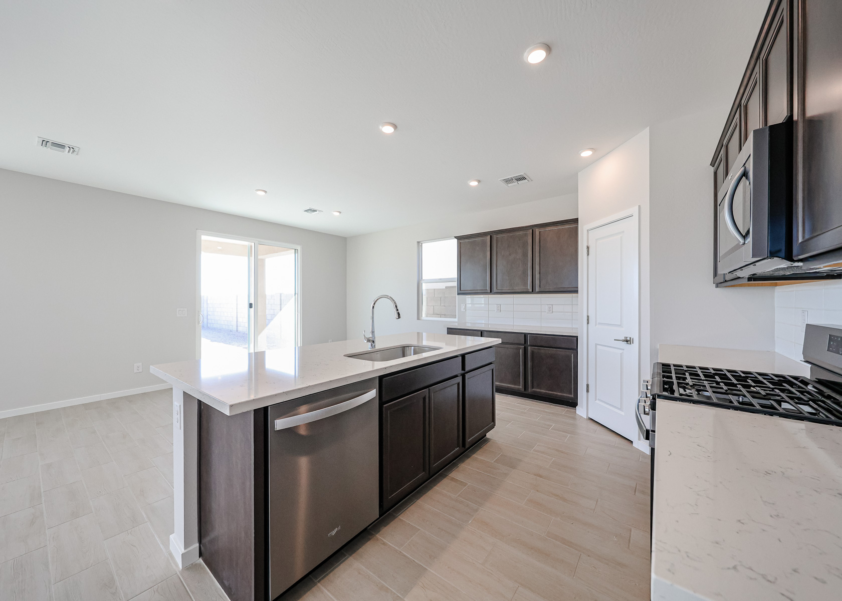A kitchen with a large island.