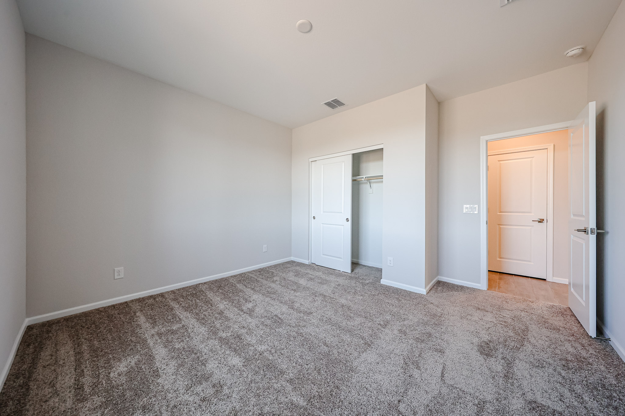 A room with white doors.