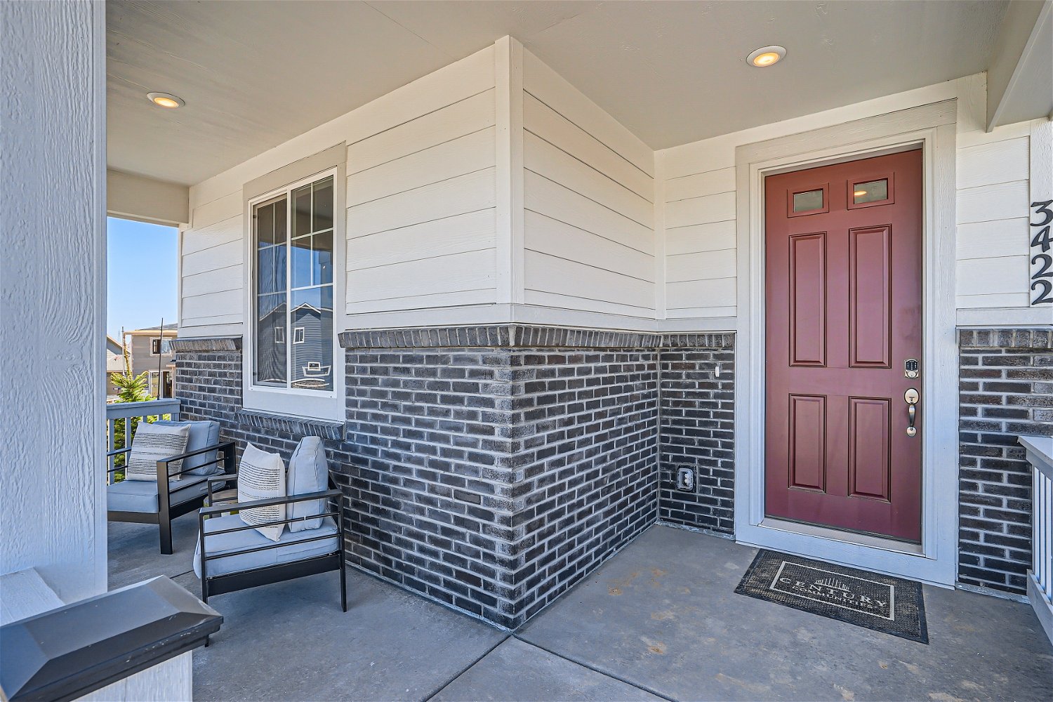 A house with a brick fireplace.