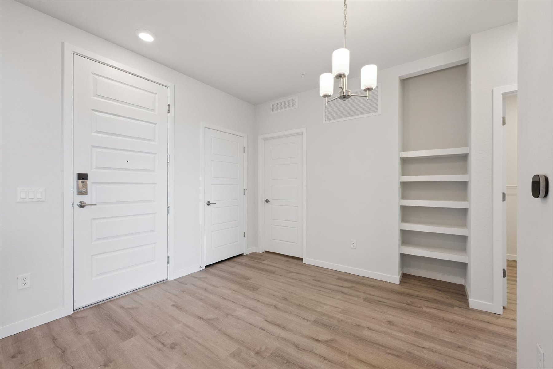 A room with white doors.