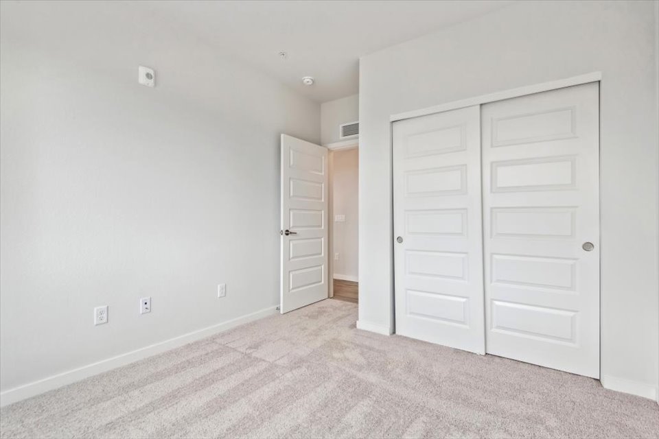 A room with white doors.