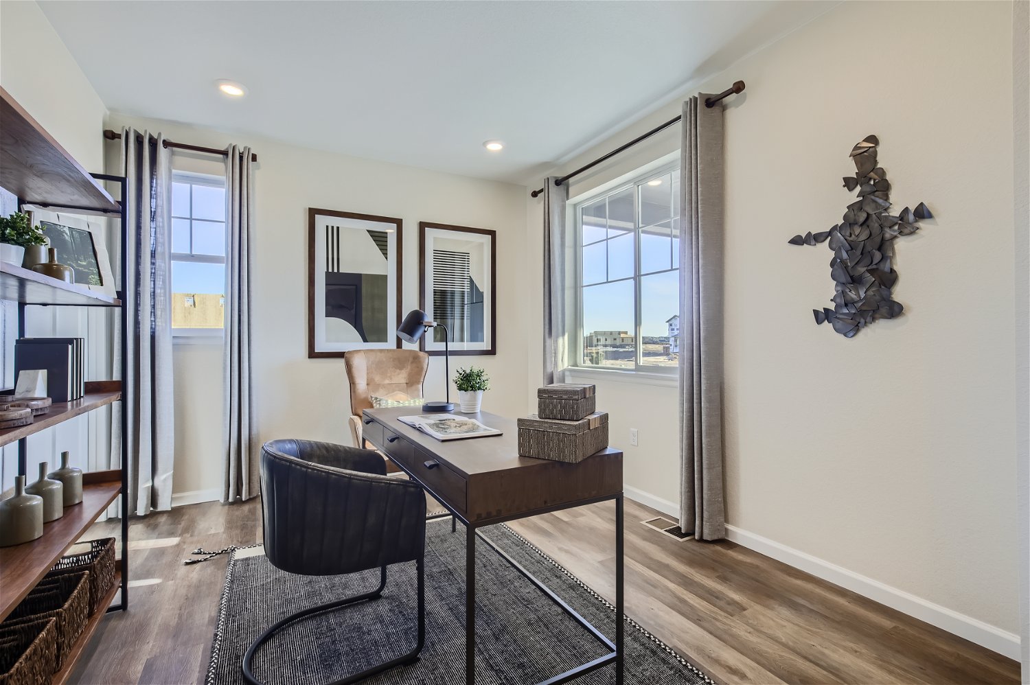 A room with a table and chairs.