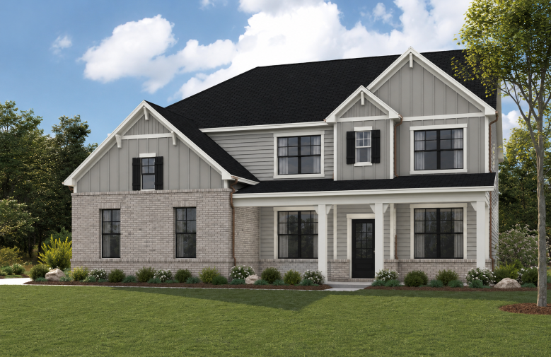 A house with a lawn in front.
