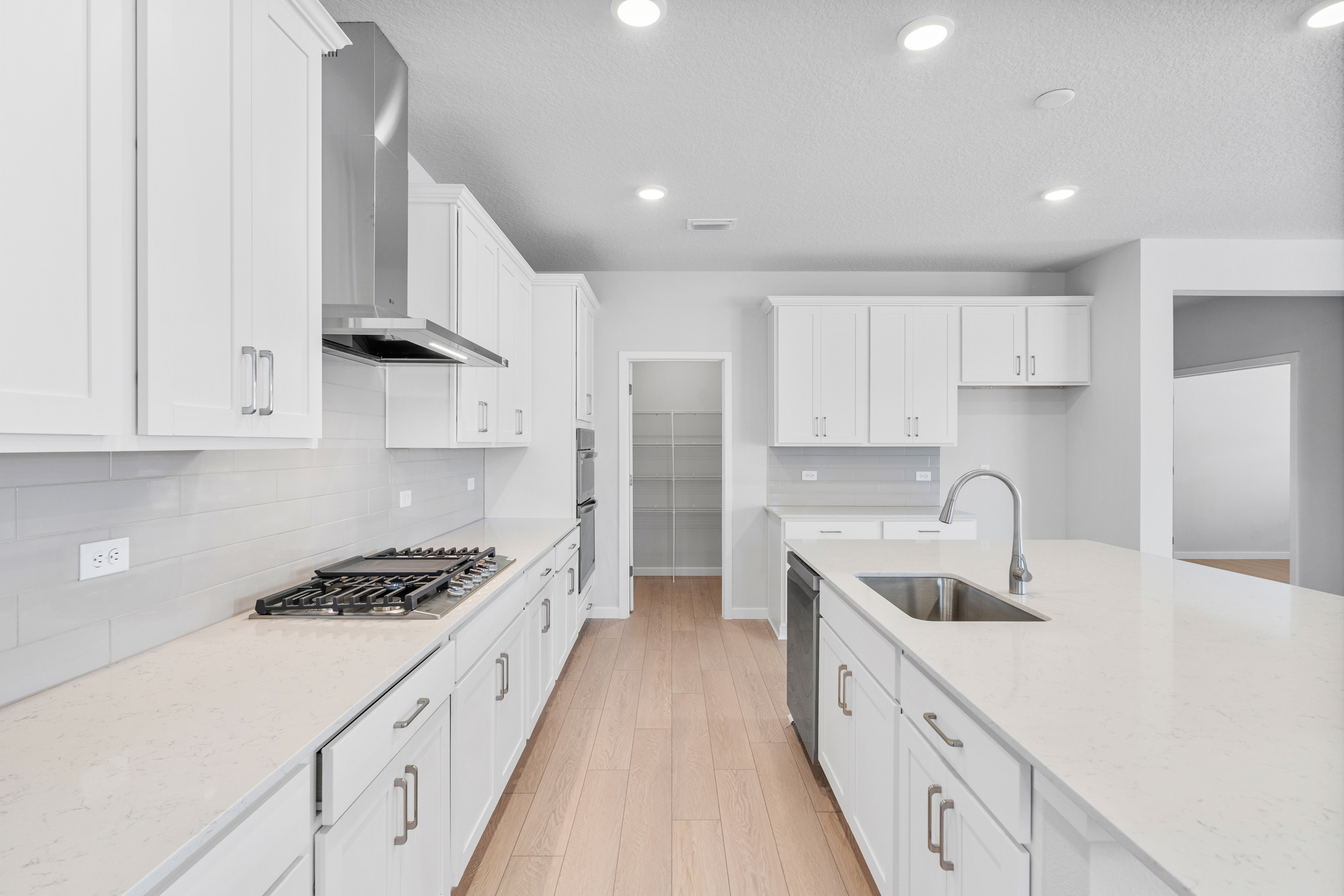 Lot 139 Chef's Kitchen with Walk-in Pantry at Reserve East