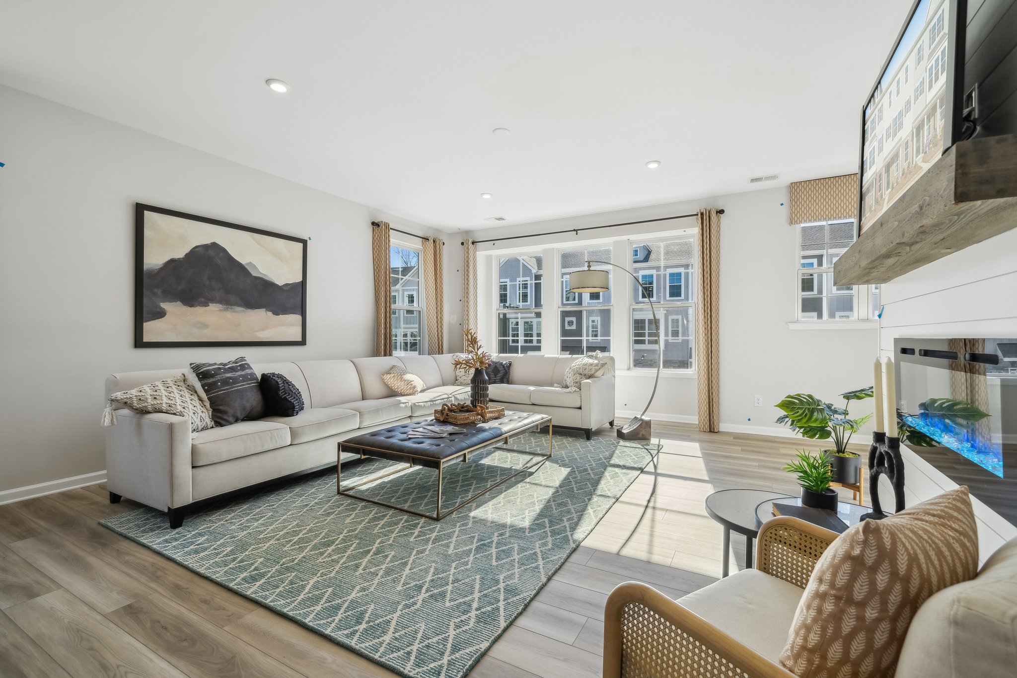 A living room with a large window.