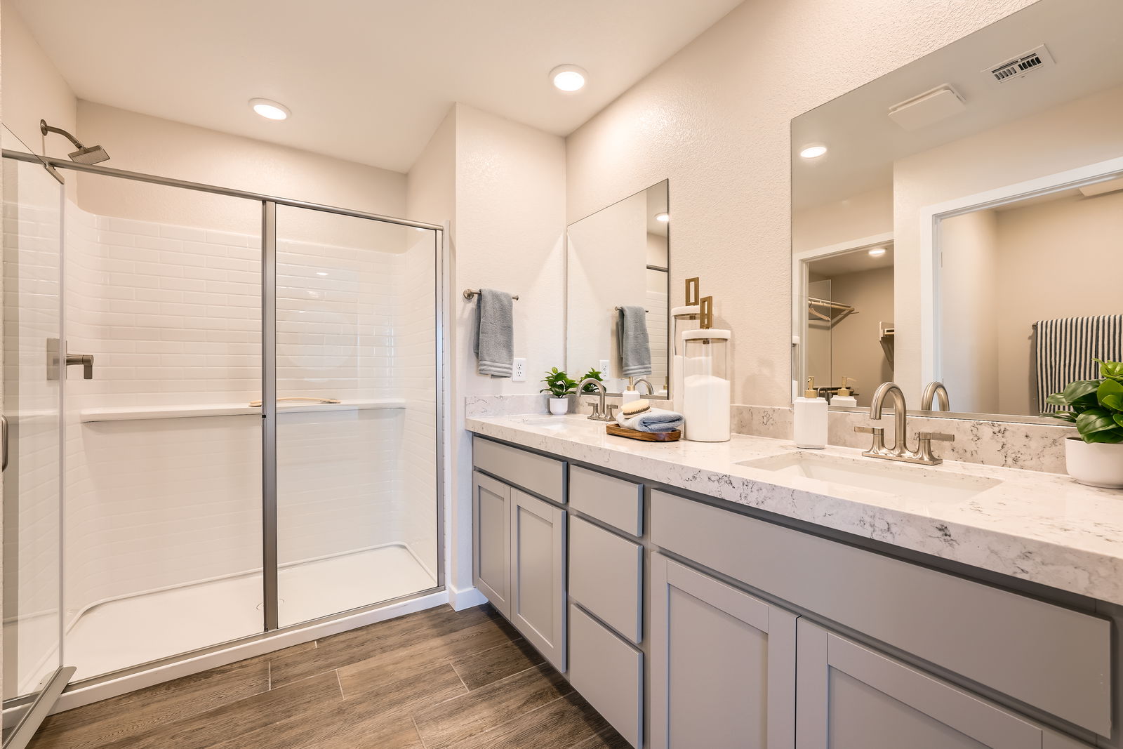 A bathroom with a glass shower.