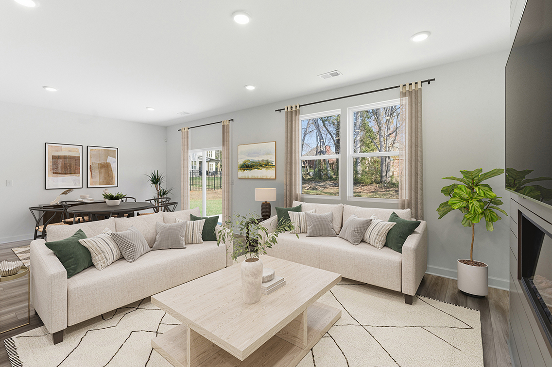 A living room with a large window.