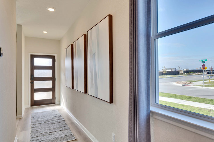 A hallway with a window.