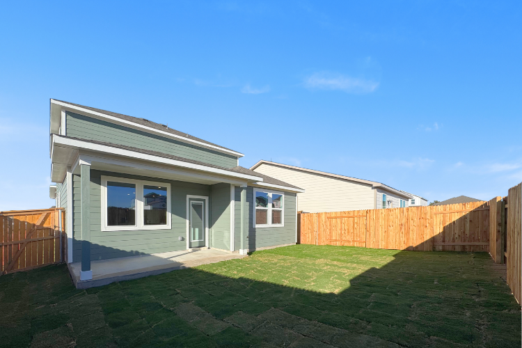 A house with a fence around it.