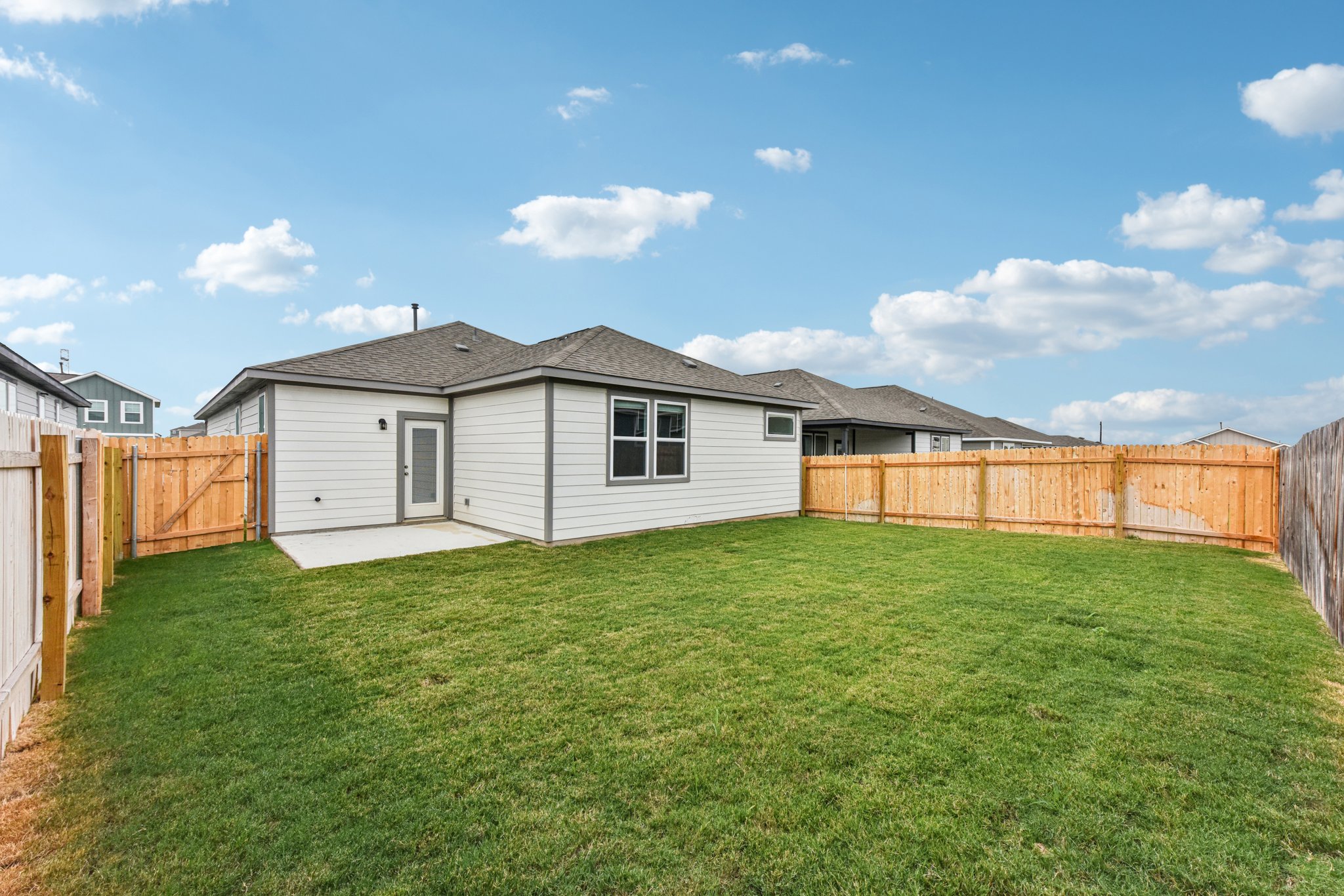 A house with a fence around it.