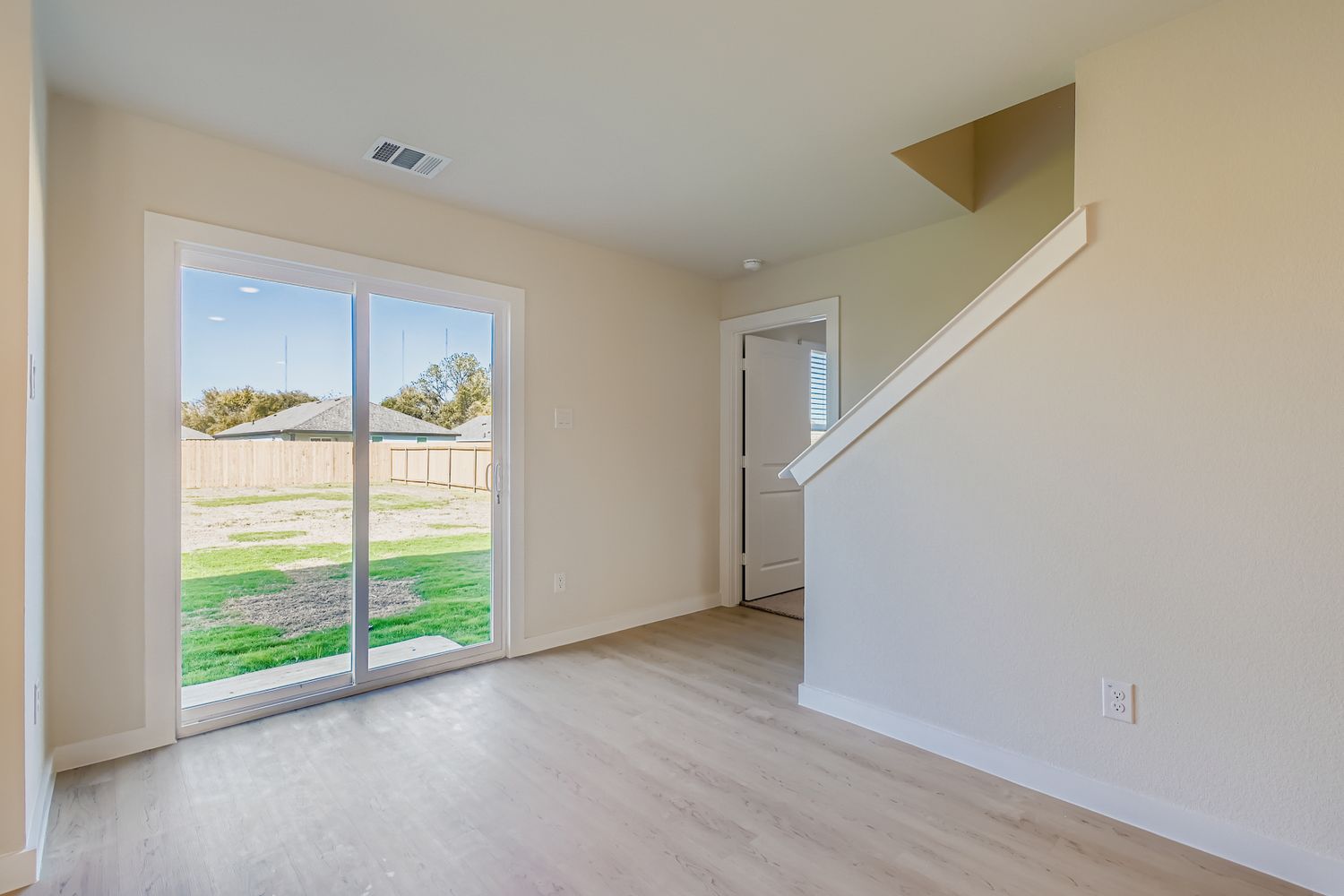 A room with a glass door.