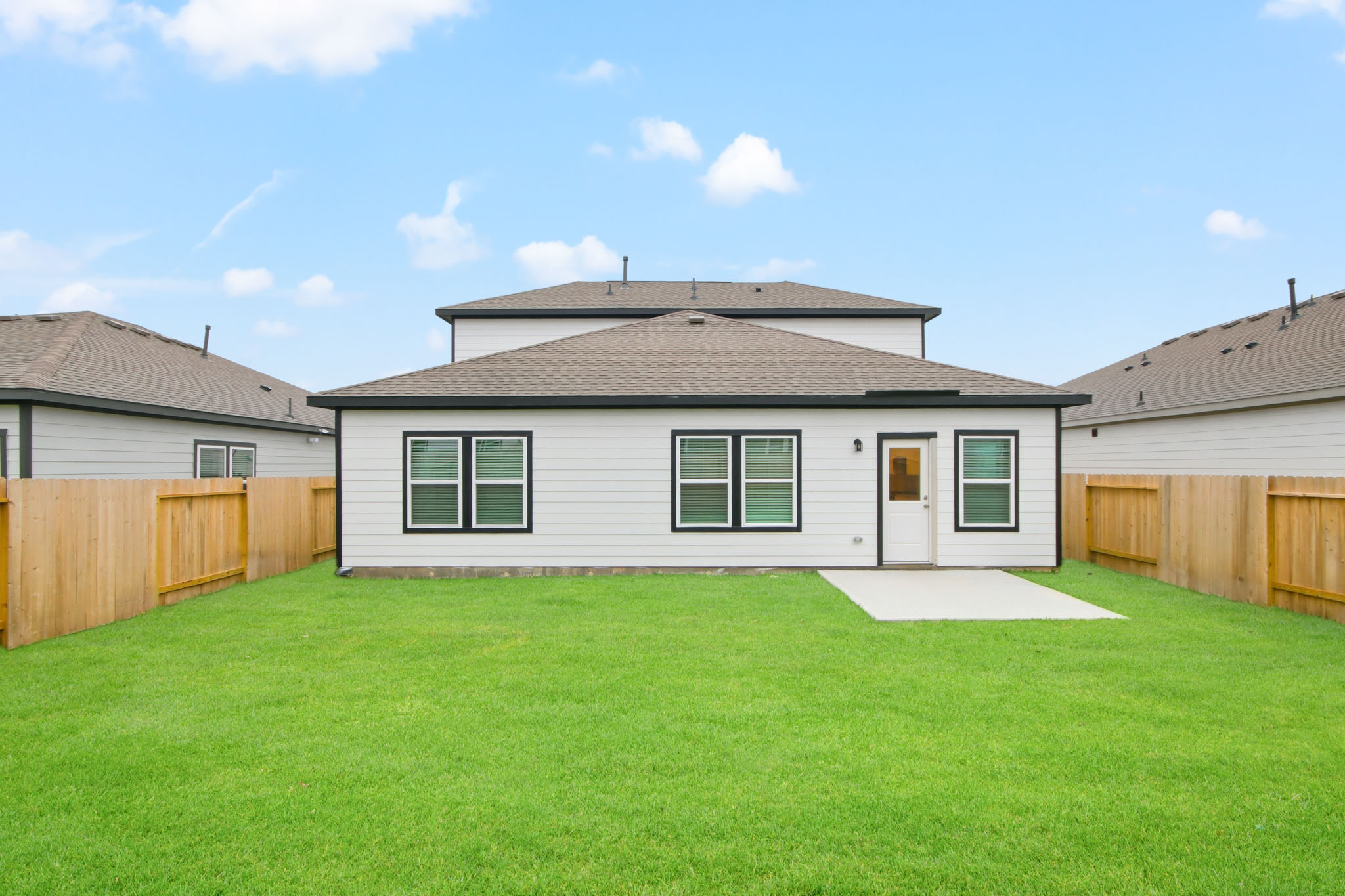 A house with a fence around it.