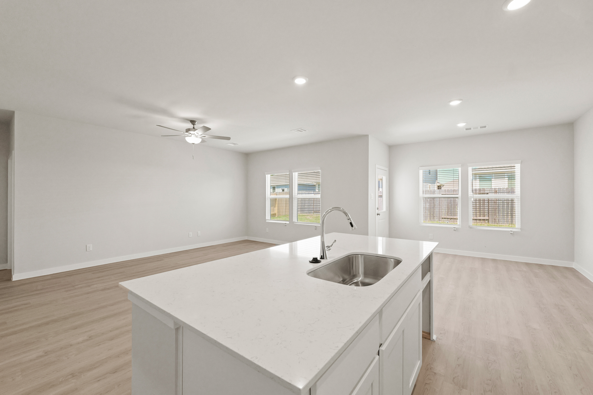 A kitchen with a sink and a countertop.