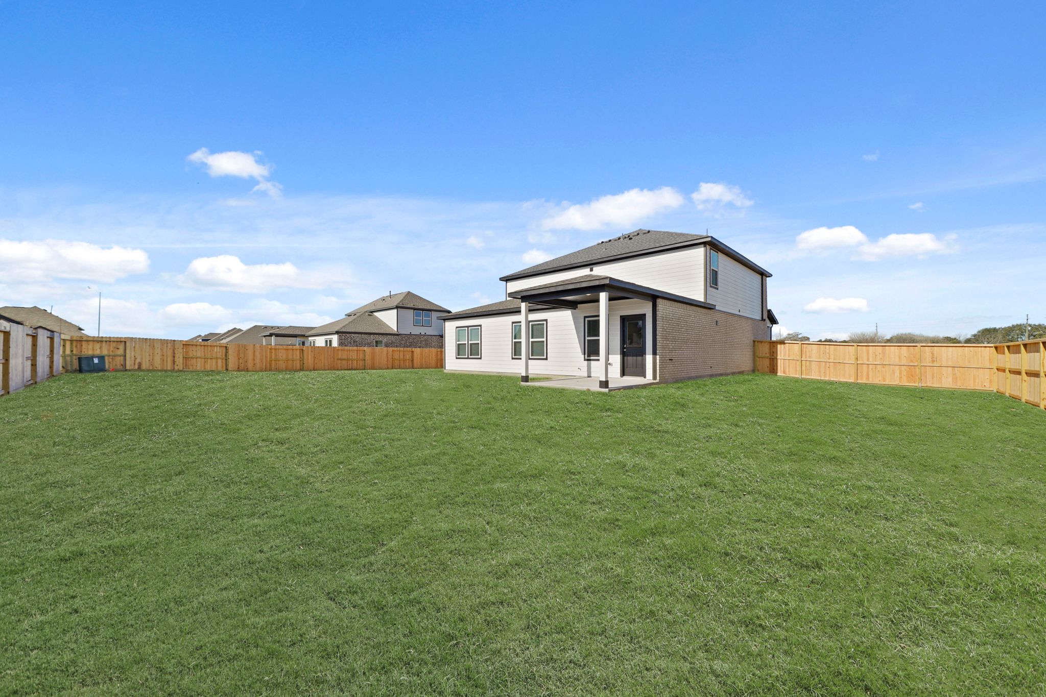 A house with a fence around it.