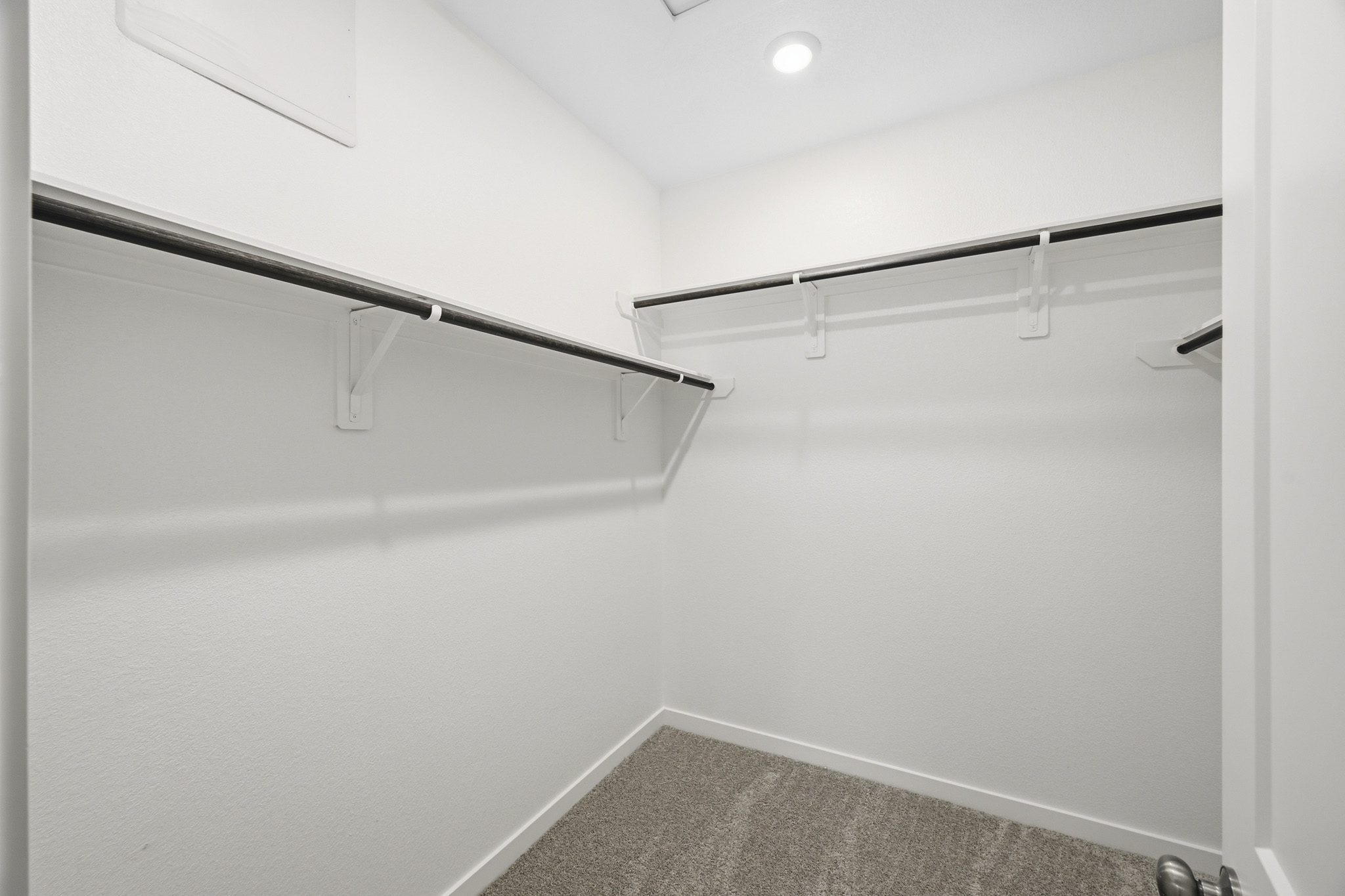 A white wall with a light.
