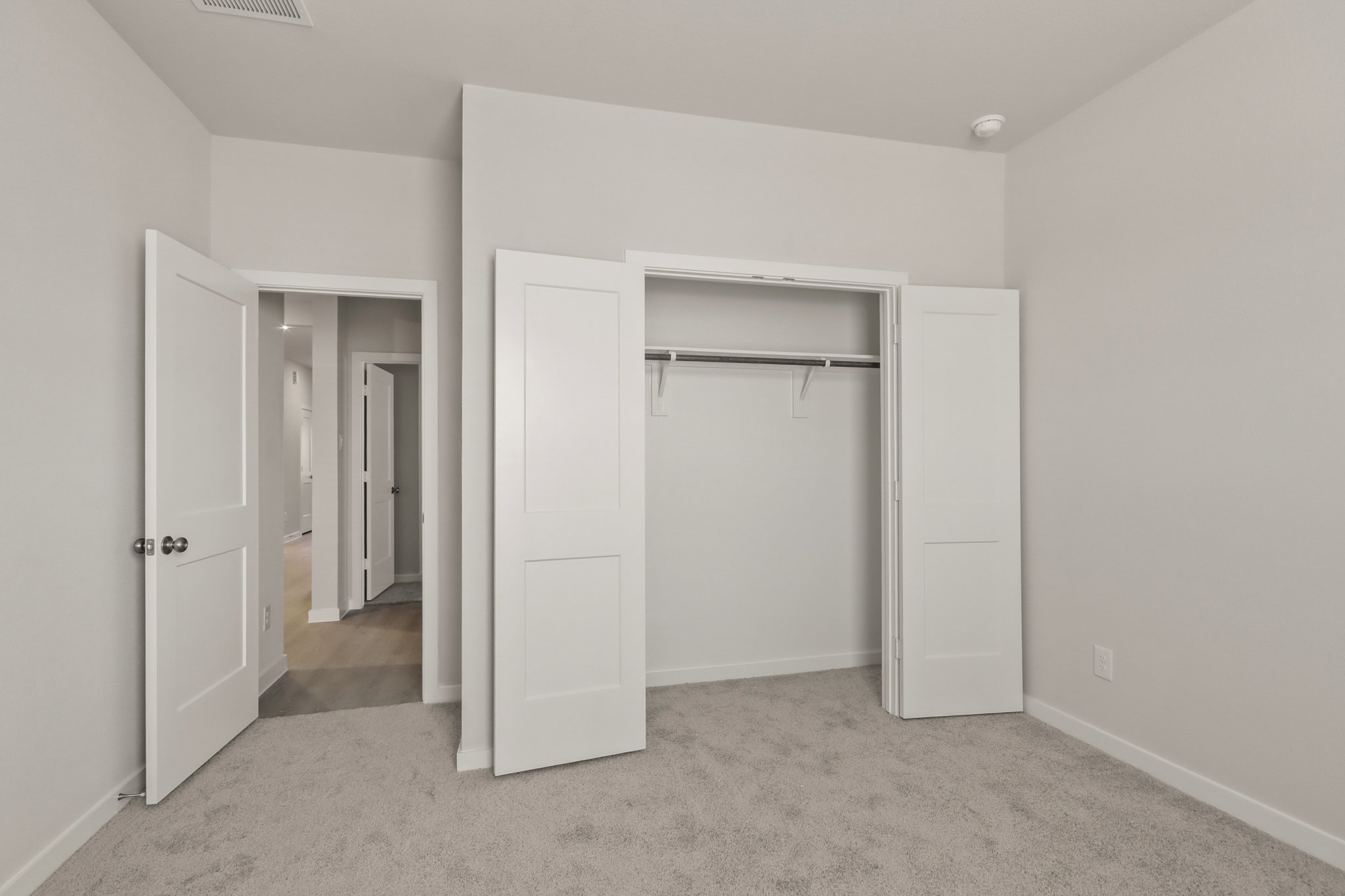 A room with white doors.
