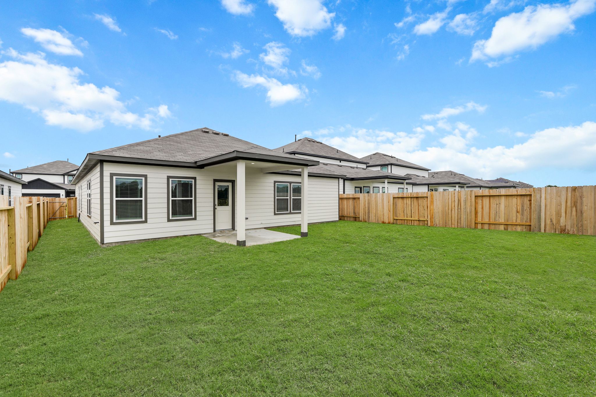 A house with a fence around it.