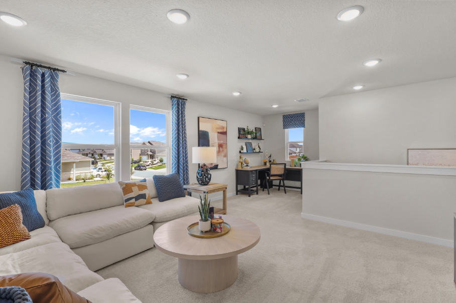 A living room with a large window.