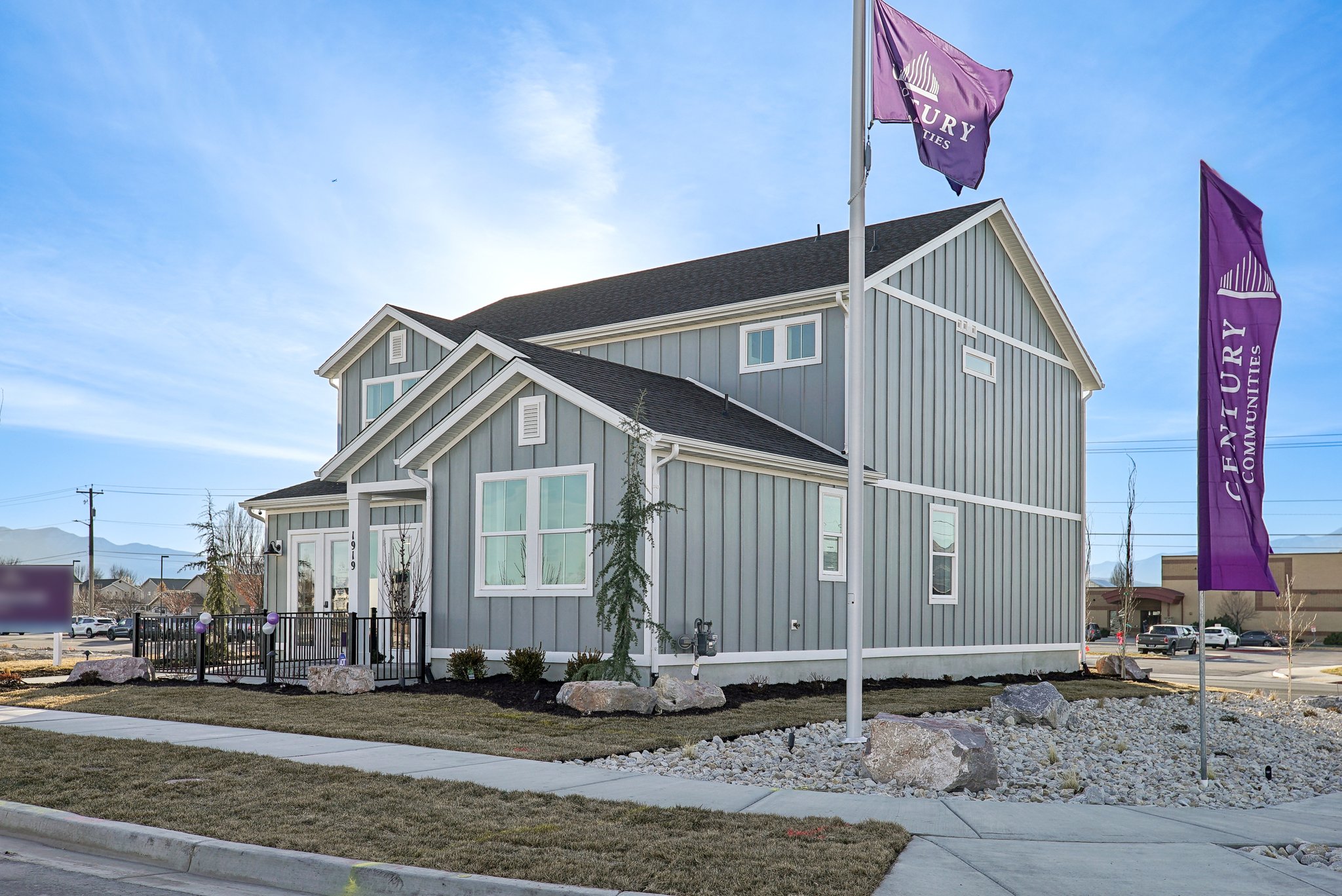 A building with flags in front of it.
