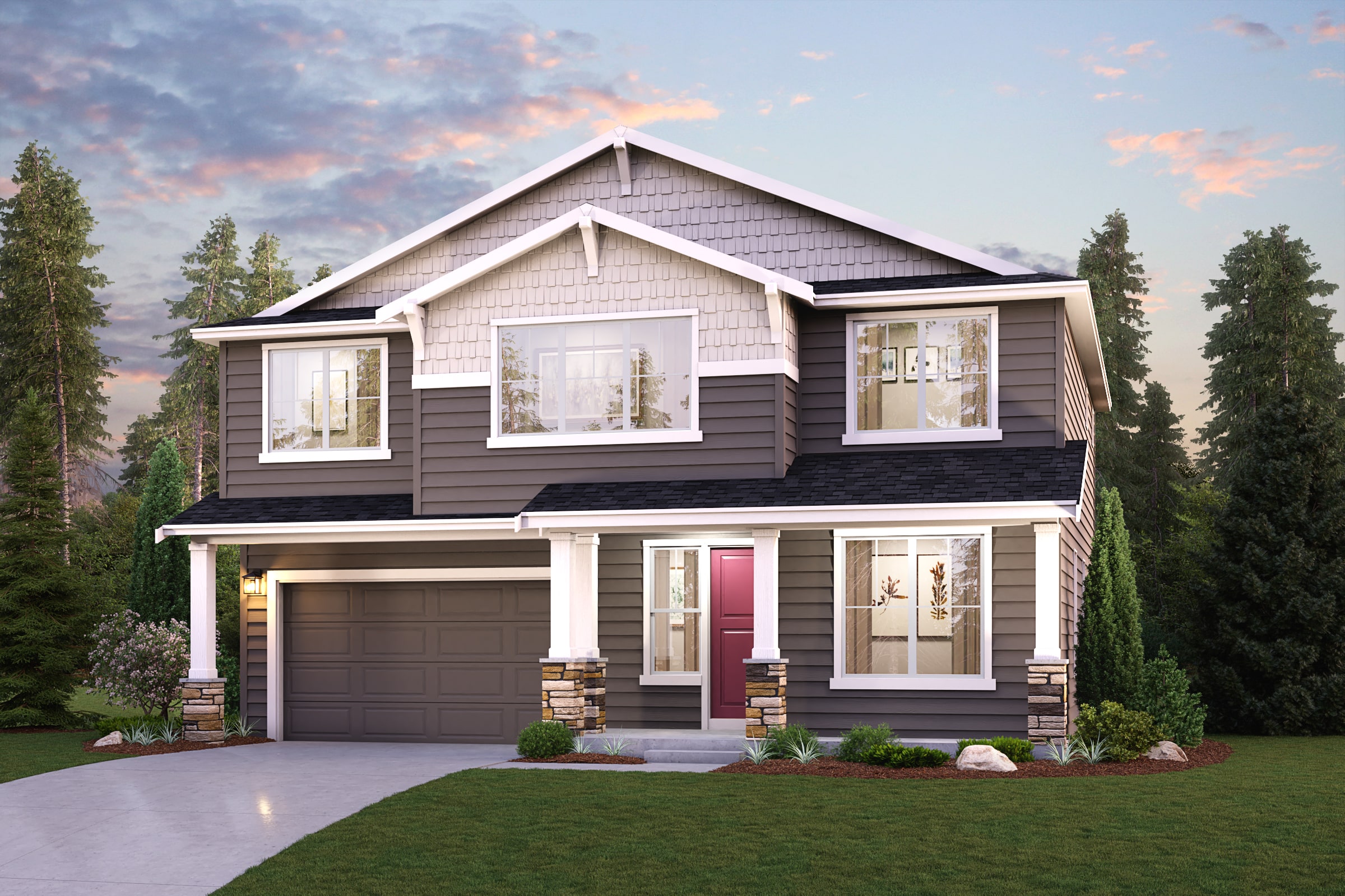 A house with a garage and trees in the back.