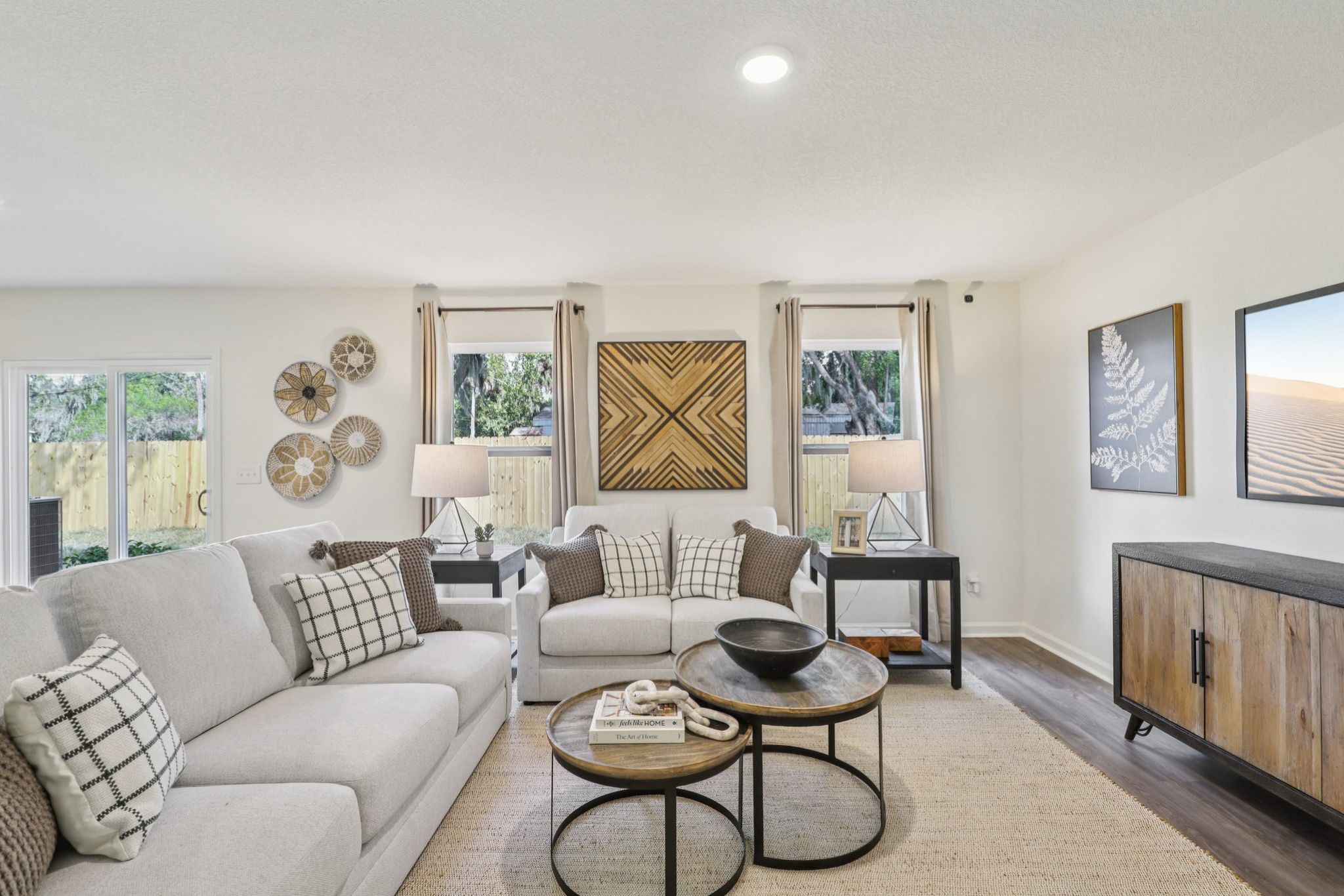 A living room with a large window.