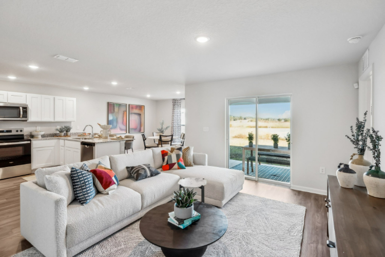 A living room with a large window.