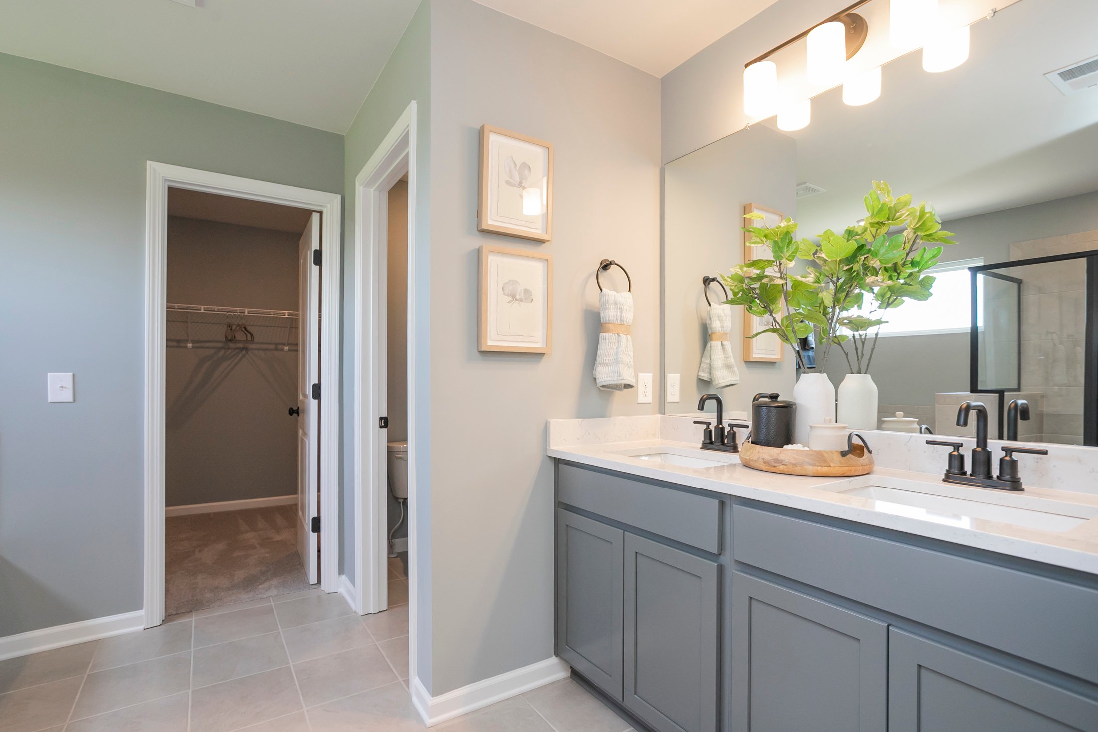 A bathroom with a marble countertop.