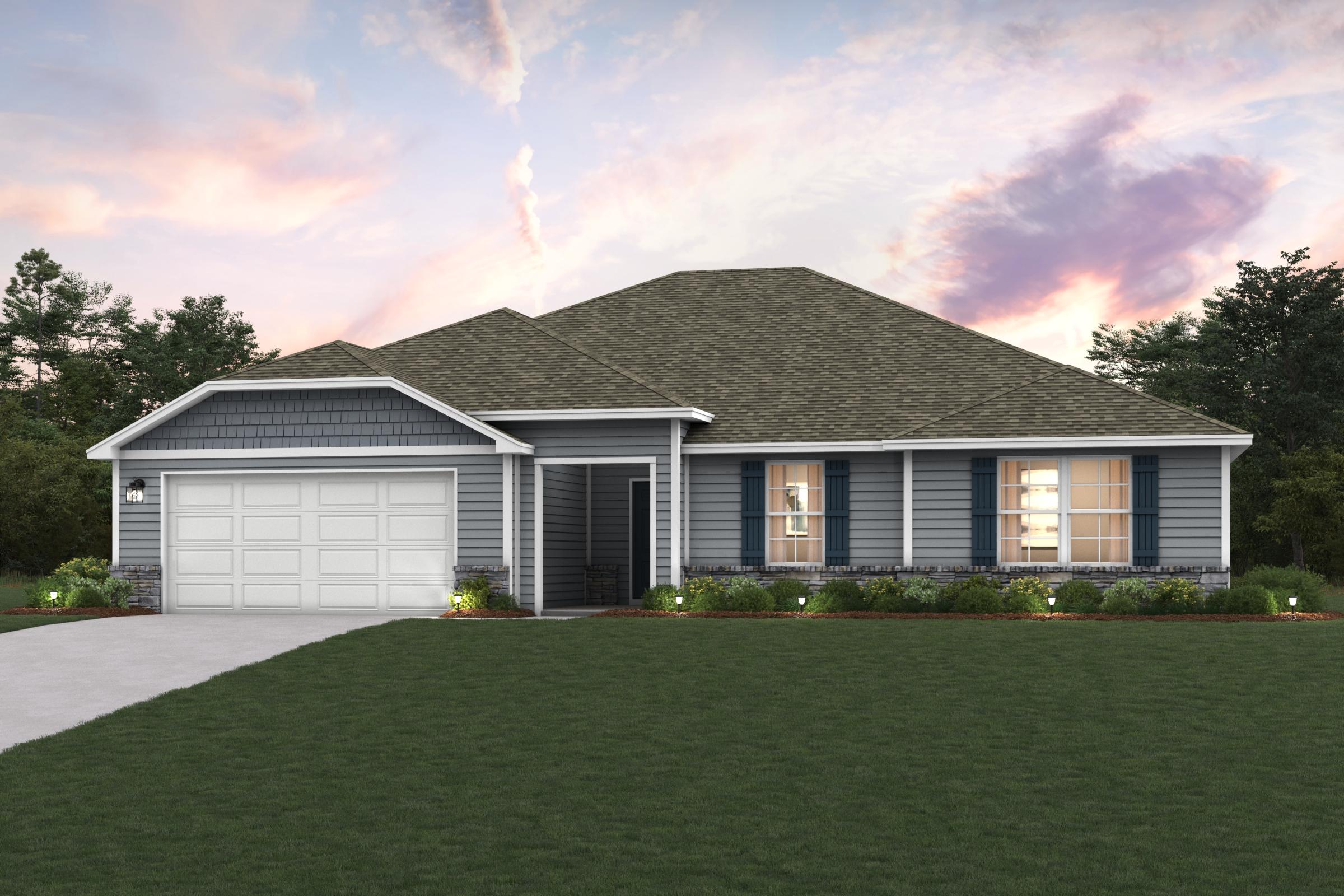 A house with a lawn in front of it.